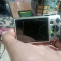 دوربین canon با لوازم جانبی