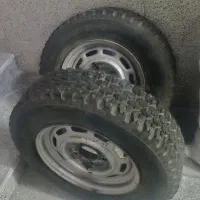 یک جفت لاستیک یخ شکن بریجستون بارینگ +یک کمک فنر