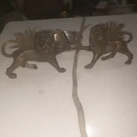 مجسمه دوتا شیر  برنجی باخورشید