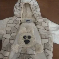 کاپشن سرهمی نوزاد