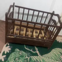 یک عدد تخت نوزاد