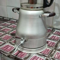 چای ساز  و۶ عدد کاسه سفالی