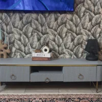 میز تلوزیون و اینه شمعدان