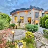 ویلاباغ-درشهرک-بااصالت-درمنطقه-برند-نزدیک-دریا