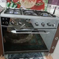 اجاق گاز طرح فر پنج شعله در حد نو