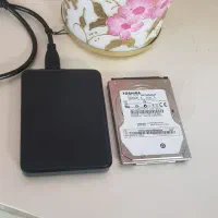 دو عدد هارد لپ تاب ۷۵۰ گیگ و اکسترنال ۳۲۰ گیگ