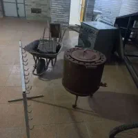 اجاق گاز . تنور . دوچرخه . کولر آبی و ۴عدد گاری