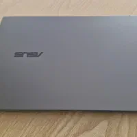 لپ تاپ ASUS Zenbook Q415MA + کول پد