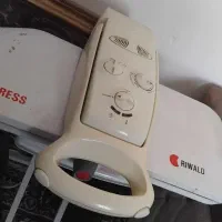 اتو بخار پرسی همراه با میز اتو