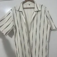 لباس نو|لباس|شیراز, بعثت|دیوار