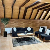 کلبه دوخوابه عاشوری تمام چوبی بانمای زیبا|اجارهٔ کوتاه‌مدت ویلا و باغ|رامسر, |دیوار