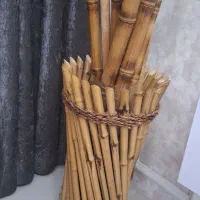 گلدان همراه با چوب بامبو