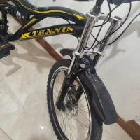 دوچرخه۲۴تنیس دیسکی درحد نو دندها وترمزها سالم
