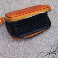 کیف مدارک و عابر بانک و کارت ملی به نام اعلامی