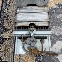آبگرمکن دیواری سوزان درحدنو سالم