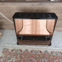 بخاری گازی ،شمعدان کریستال ،ماهیتابه و گل و دکوری