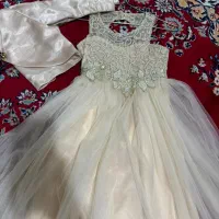 لباس عروس بچگانه به همراه یک کت تک همرنگ