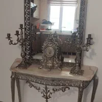 آینه و کنسلول شمعدان و ساعت
