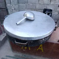 دیگ مرغ و خورش و شعله روی دیگ