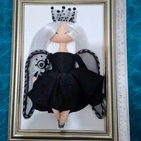 عروسک دستساز پارچه‌ای