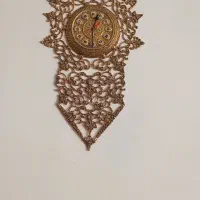 ساعت و ظرف میوه خوری برنجی