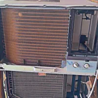 کولر پنجره ای در سمساری کوهی زاده|کولر گازی و فن‌کوئل|سیریک, |دیوار