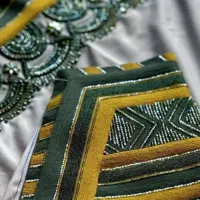 شلوار کاموایی و ملیله ایی کار دست