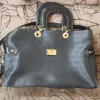 کیف|کیف، کفش، کمربند|قم, باغ اشرافی|دیوار