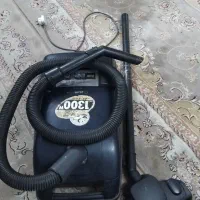 جاروبرقی و آیینه کنسول