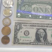 تعدادی سکه اسکناس