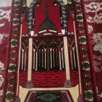 تعدادی سجاده با مهر و تسبیح