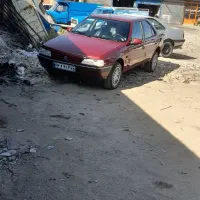 پژو ۸۳ عنابی عروسک