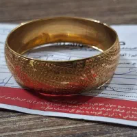 طِلا