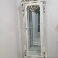 بوفه چوبی و ساعت ایستاده