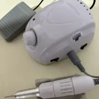 دستگاه کاشت ناخن