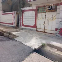 فروش نیم پلاک وهمراه یک مغازه  تک خواب  حیاط دار