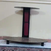 زیر تلویزیونی شیشه‌ای