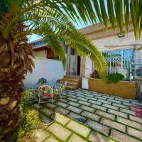 ویلاباغچه۱۵۵متری،سنددار،دوخوابه،محله دنج و اروم