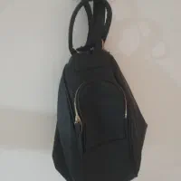 کیف کاملا نو هم کوله پشتی  هم روشونه و۴ جفت جوراب