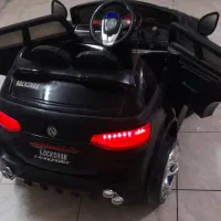 ماشین شارژی ۲ موتوری فنر دار شاسی بلند
