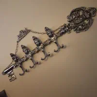 ساعت برنز و آویز برنز