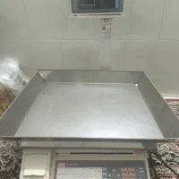 ترازوی محک و یخچال بزرگ