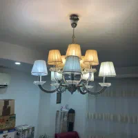 لوستر ده شاخه و دو عدد لوستر سه شاخه