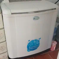 یک عدد لباسشویی