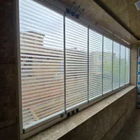 شیشه سکوریت.نرده شیشه. جام بالکن.کرکره برقی.پارتشن