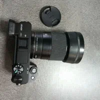 دوربین سونی a6400 با لنز سیگما 30mm f1.4