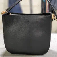 کیف دوزی . چرخکار ، تخته کار. چرم طبیعی.