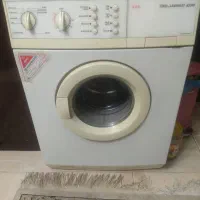 ماشین لباس شویی آاک مدل 62310 آلمانی- ارسال رایگان