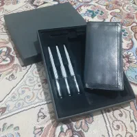 خودکار و کیف چرم