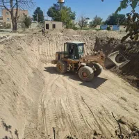 خاکبرداری با لودر و بیل،حمل نخاله،مصالح ساختمانی